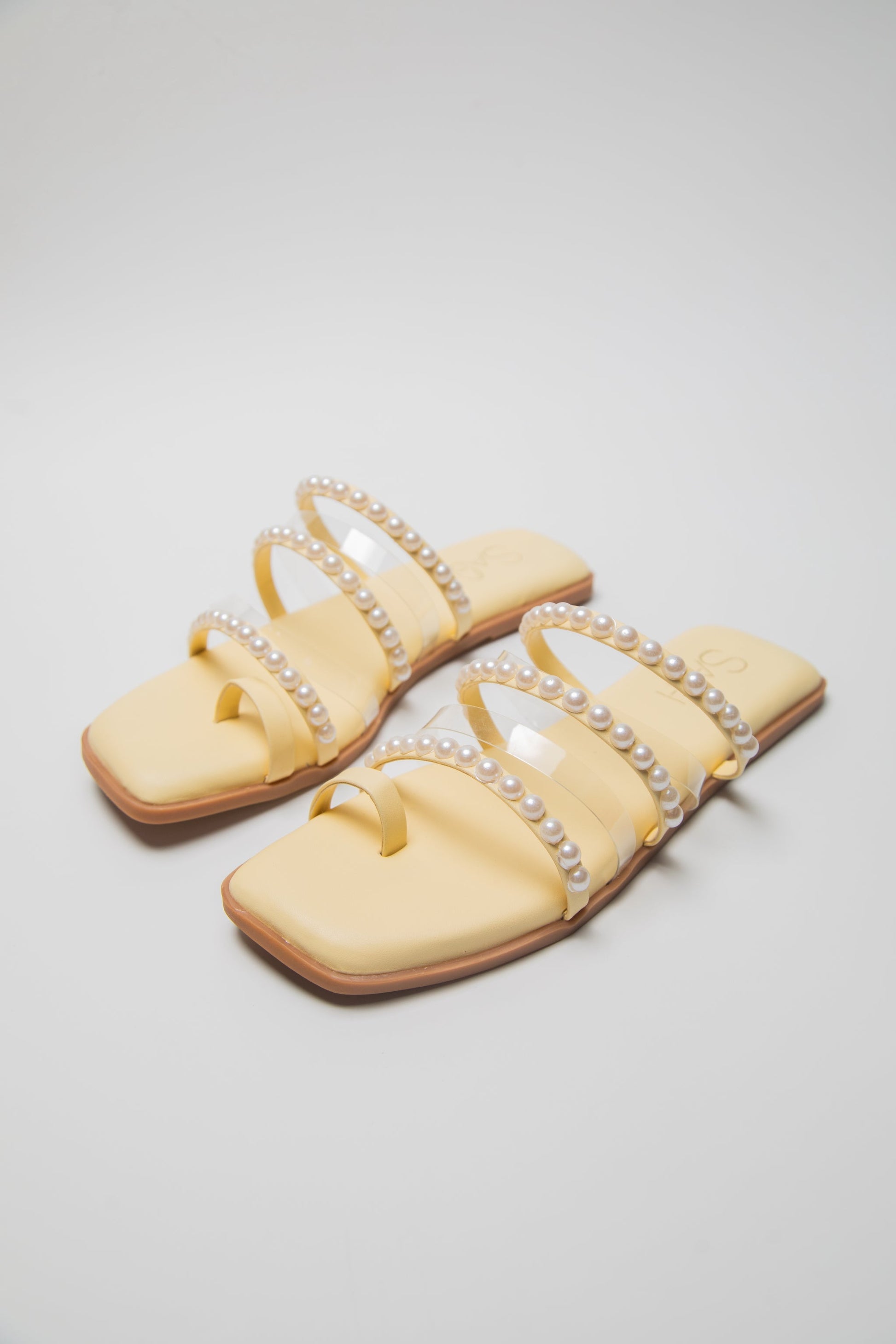 Stylera yellow pearl sandals for women with multiple pearl-embellished straps and square toe flats
