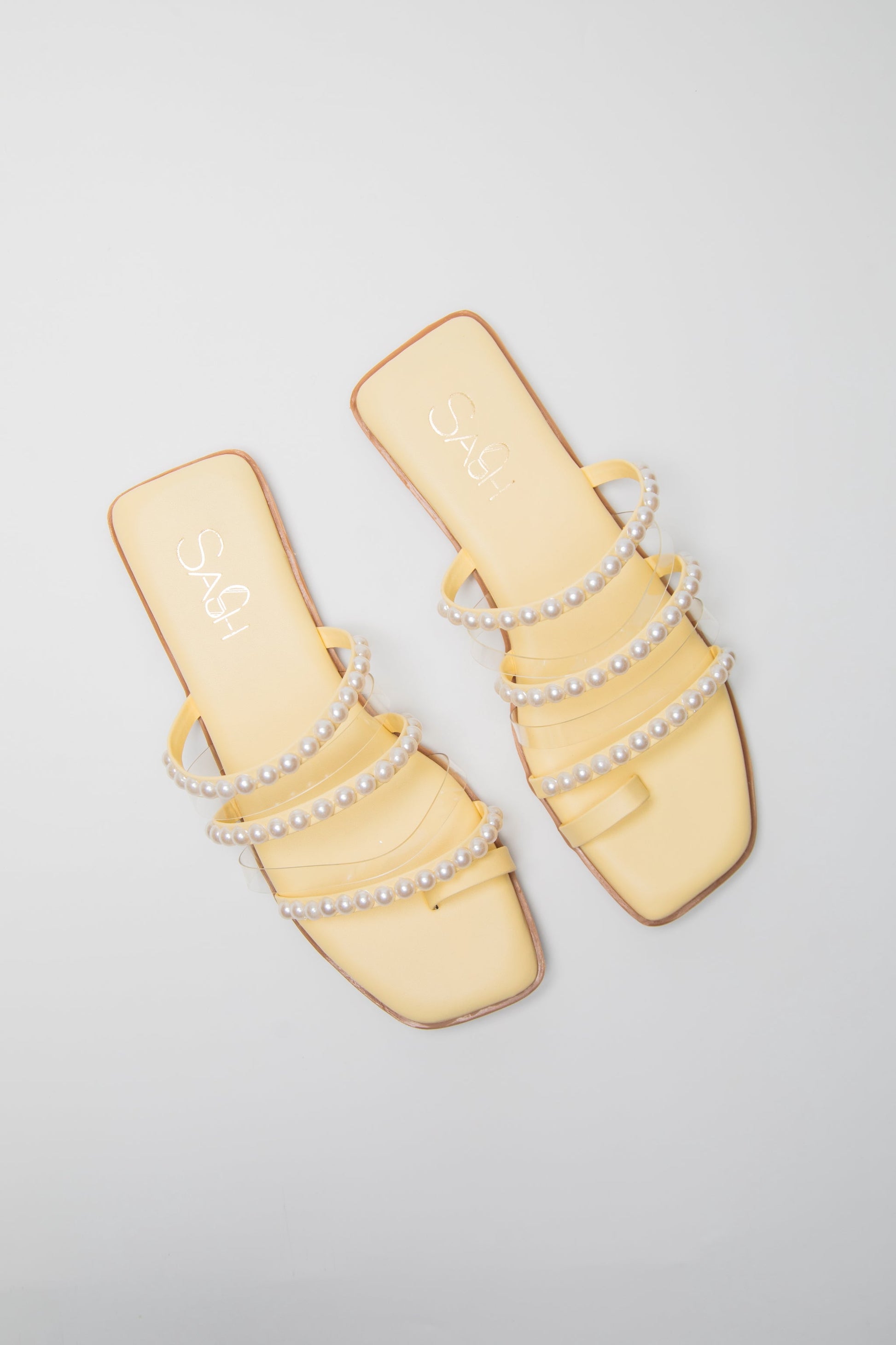 Yellow pearl sandals for women by Stylera with square toe and multiple pearl-adorned straps
