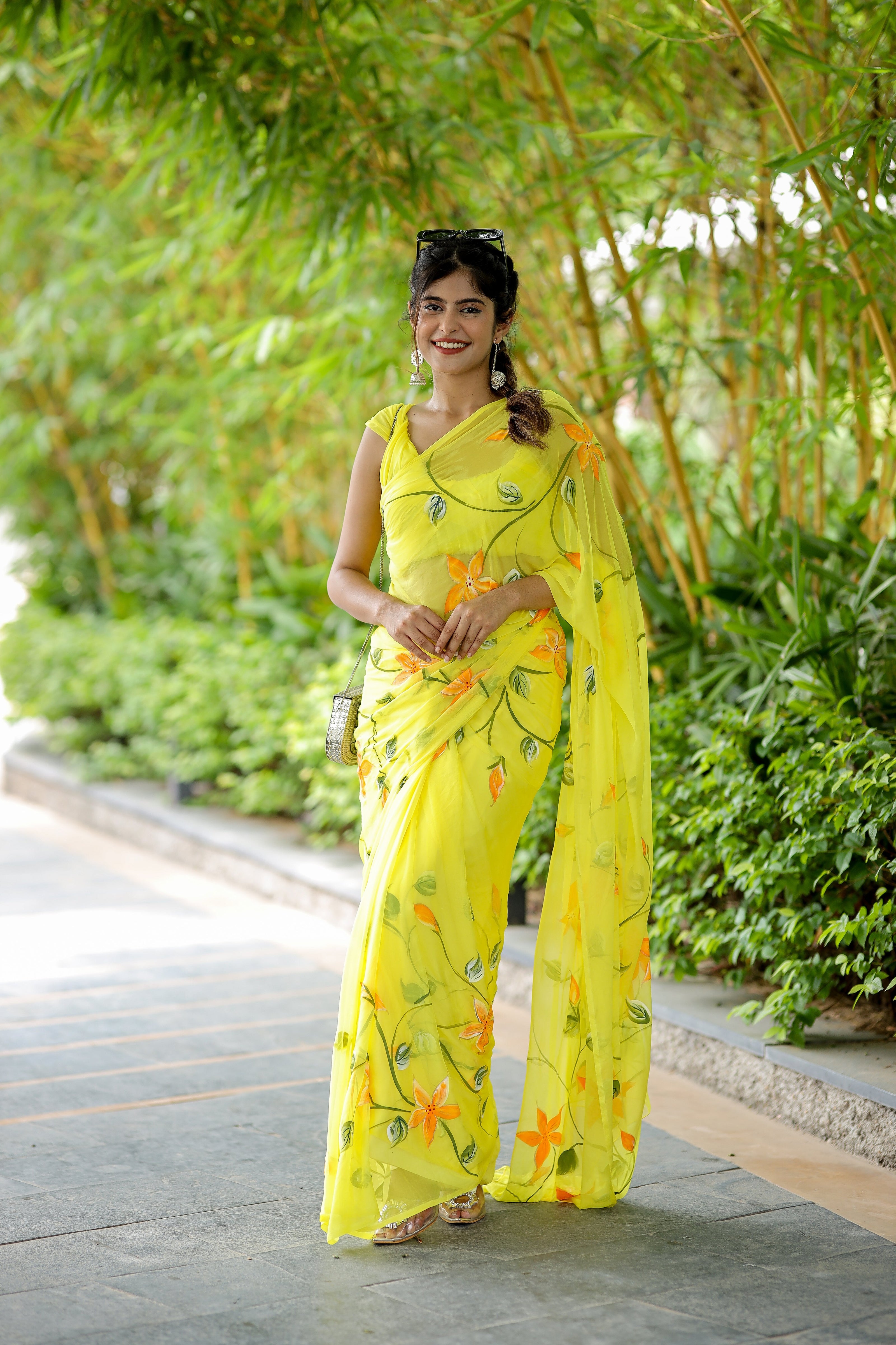 Elegant yellow saree with floral print, perfect for festive occasions and summer events