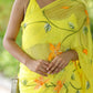 Stylera yellow saree with floral print featuring vibrant flowers and elegant draping