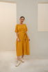 Yellow summer midi dress with short sleeves and a tied waist for a stylish look