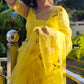 Elegant yellow sunflower saree by DiraByDimple with floral embroidery and sheer pallu