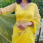 Elegant yellow sunflower saree by DiraByDimple with floral embroidery for festive occasions