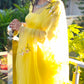 Elegant yellow sunflower saree with floral embroidery, perfect for festive occasions and celebrations.