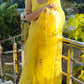Beautiful yellow sunflower saree with floral embroidery, perfect for festive occasions