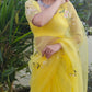 Elegant yellow sunflower saree with floral embroidery, perfect for festive occasions or casual wear
