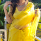Elegant yellow sunflower saree featuring intricate embroidery, perfect for festive occasions