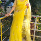 Elegant yellow sunflower saree with delicate floral embroidery, perfect for festive occasions