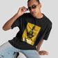 Stylera Lifestyle black oversized graphic t-shirt with yellow rectangular print worn by male model with sunglasses